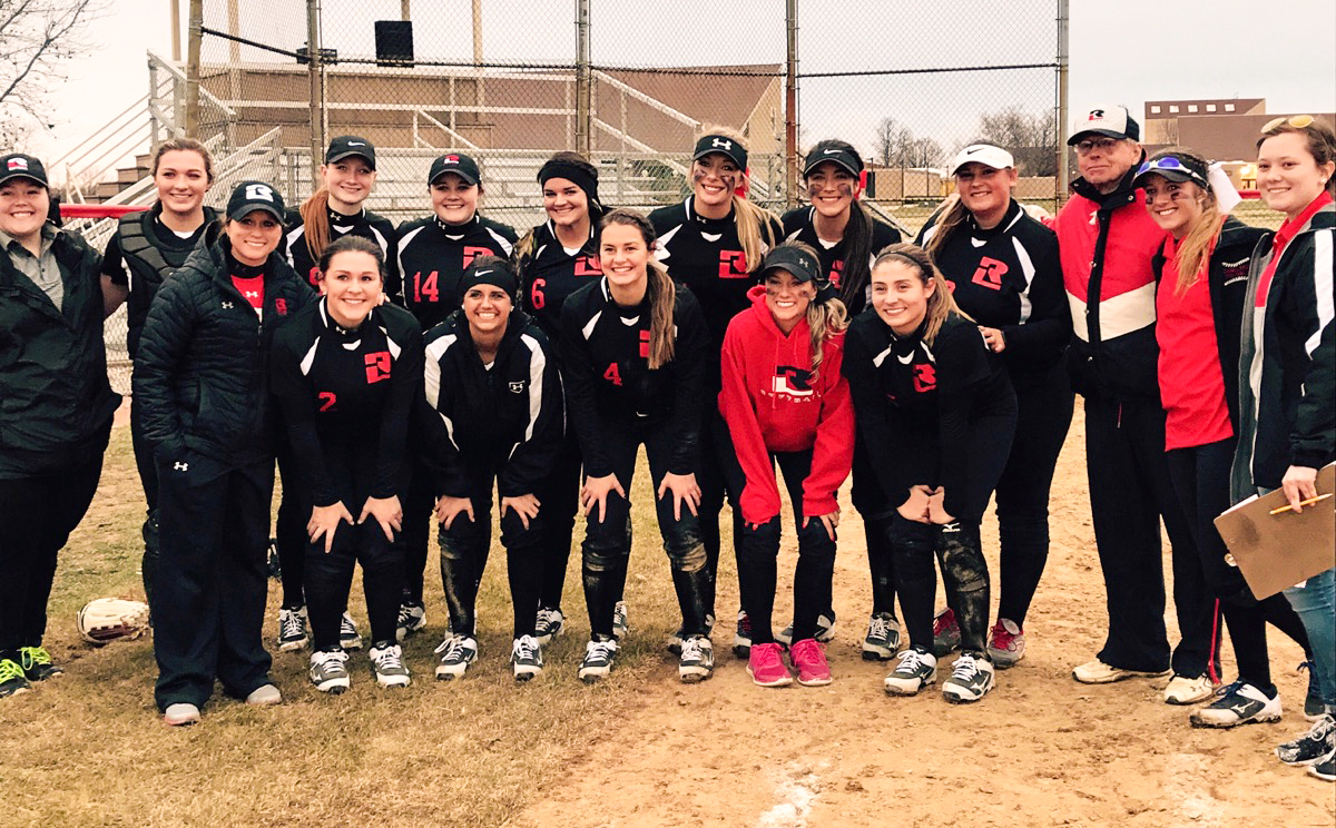 Ellingsworth and the 2017-2018 RLC softball team pose for a photo following Ellingsworth's 900th career victory. 